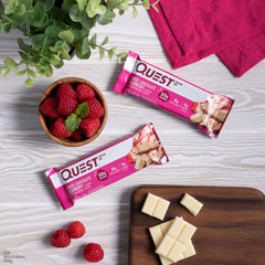 Quest protein bar pictured in a gym bag for post-workout fuel.