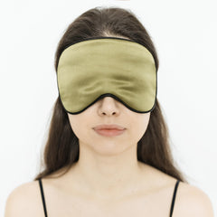 Quietstore silk sleep mask green packaging, travel-ready design.