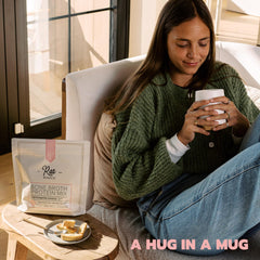 Rae Basics hot beverage preparation with mug and cocoa aroma