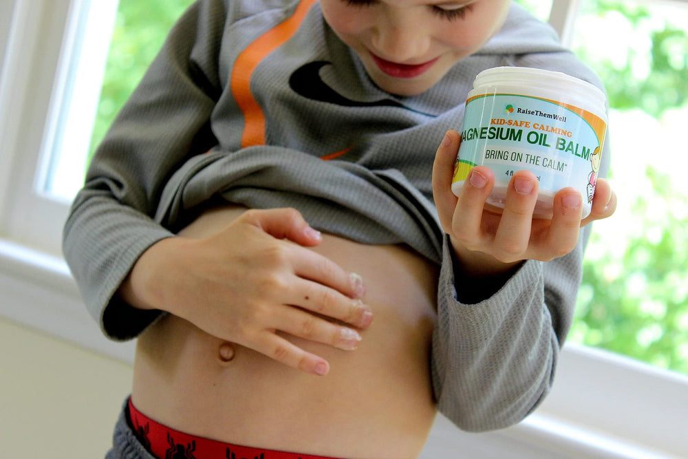 Ingredients panel of Raise Them Well calming balm featuring magnesium and skin-friendly oils