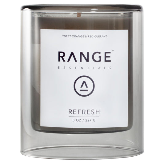 Range Essentials Refresh Candle front view reveals fruit scent in a clean glass jar for uplifting ambiance.