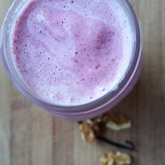 Raw Organic Whey powder in shaker bottle blends easily for daily smoothies.