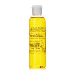 R.D. ALCHEMY Juicy Citrus bottle pour shows natural edible massage oil for a refreshing massage.