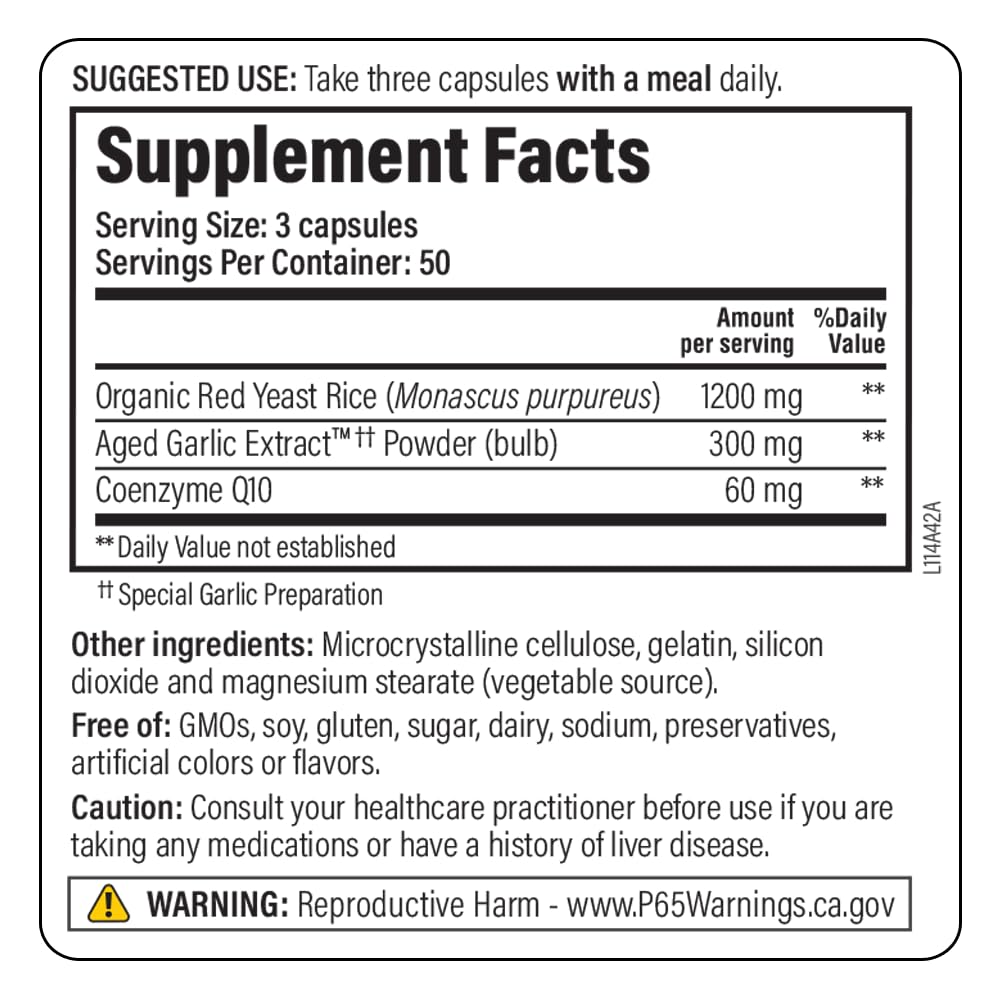 Closeup of red yeast rice CoQ10 capsules inside blister pack.