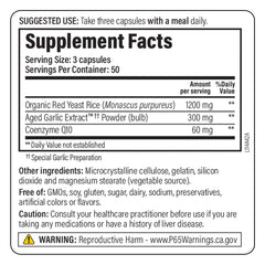 Closeup of red yeast rice CoQ10 capsules inside blister pack.