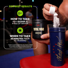 Glass with Redcon1 Total War grape shake ready to energize training.