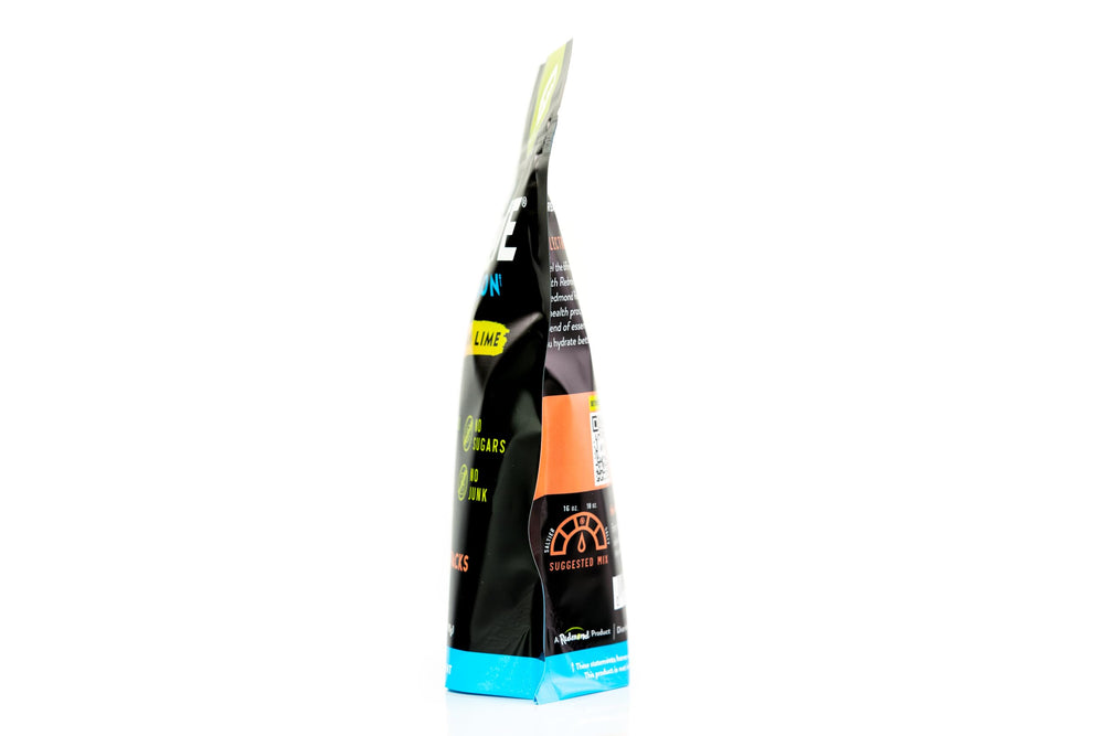 REDMOND Re-Lyte bottle with glass demonstrates ready-to-make hydration mix