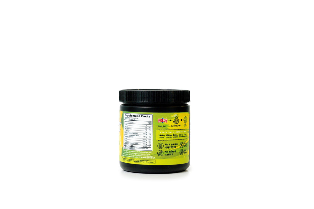 REDMOND Re-Lyte Kids Pineapple stir-glass shows mixing electrolytes after practice.