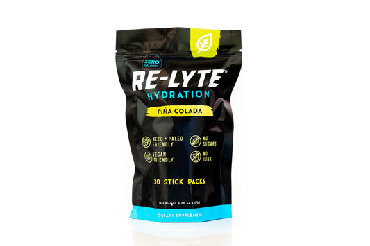 Redmond Re-Lyte Piña Colada stick-pack for on-the-go hydration during workouts.