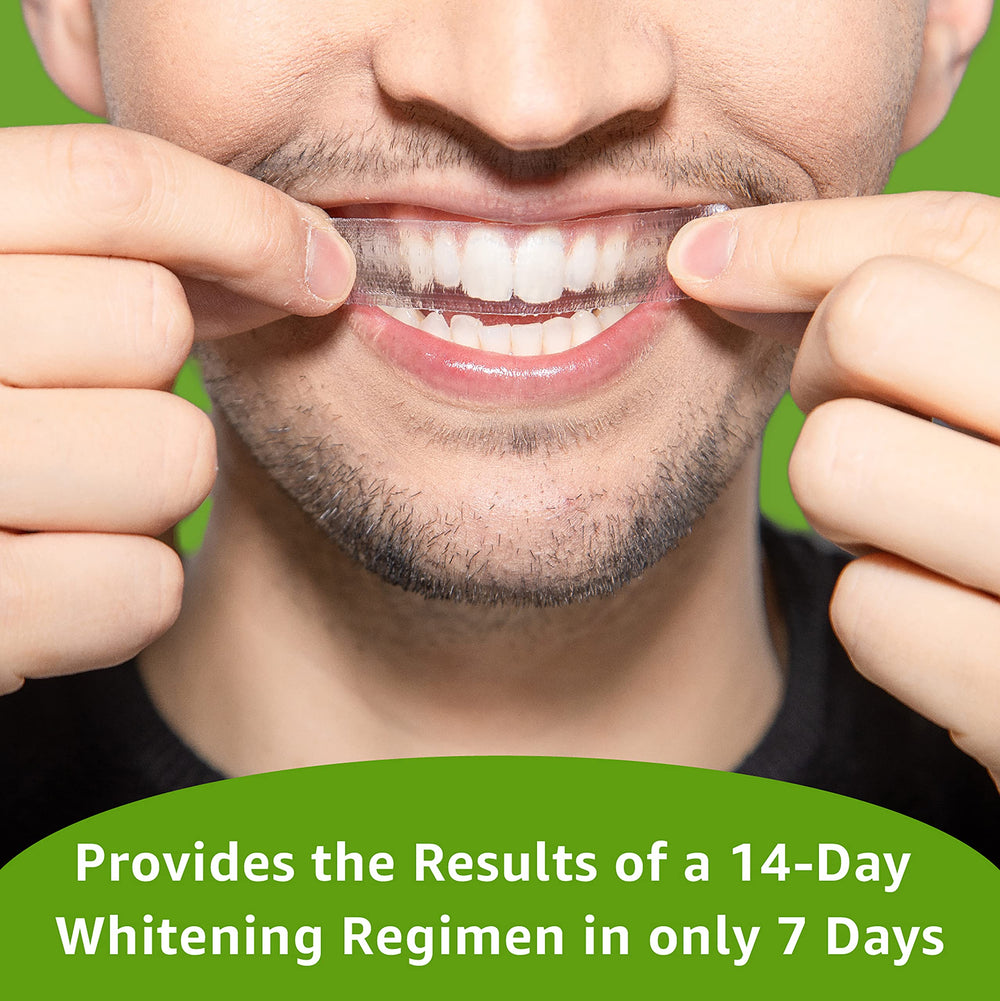 Rembrandt strips applied on teeth showing even coverage across front and back surfaces.