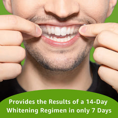 Rembrandt strips applied on teeth showing even coverage across front and back surfaces.