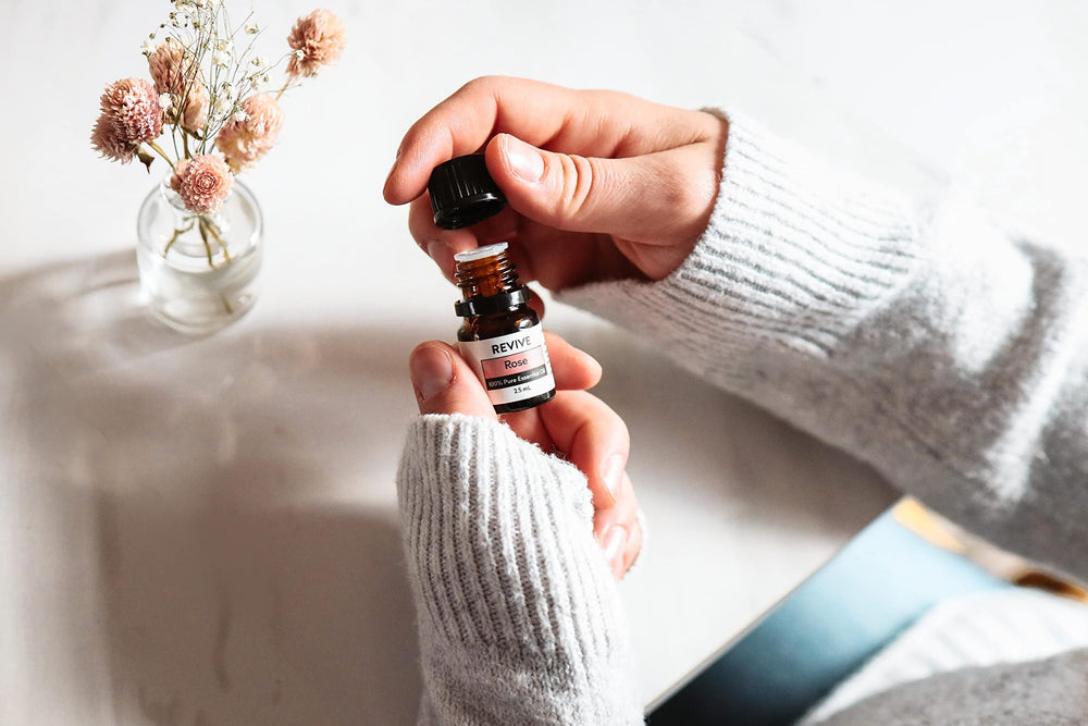 Revive Rose Essential Oil vapor creates a calming ambiance.