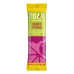 ROAR electrolytes powder on desk with ingredients, gluten-free and GMO-free.