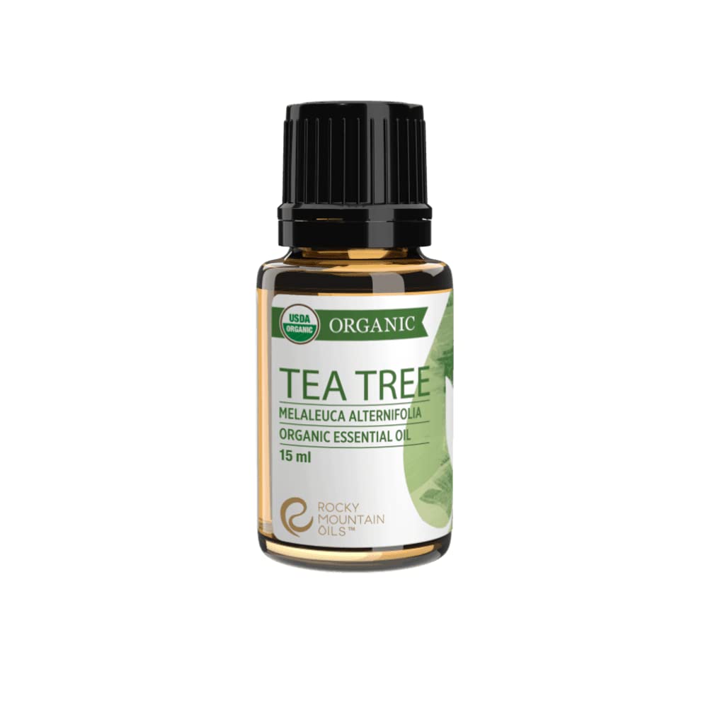 Rocky Mountain Oils Tea Tree Oil bottle; pure and organic for skin and home cleansing.