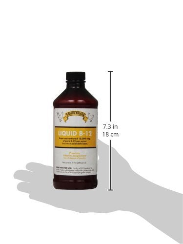 Rooster Booster B-12 Liquid bottle pour for precise supplementation.