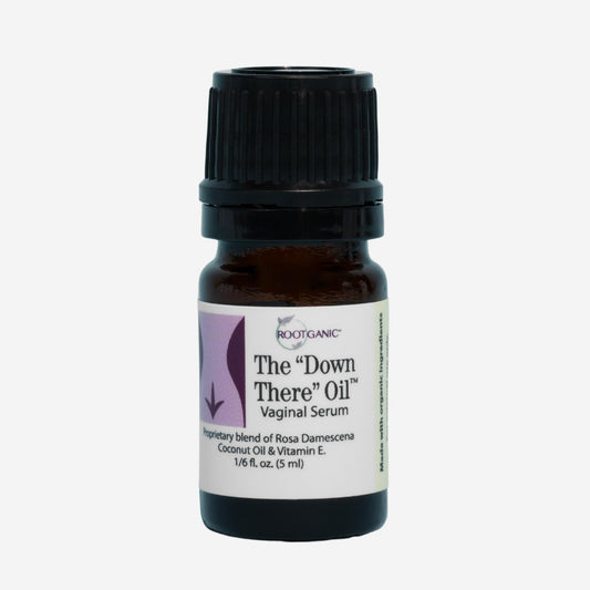 Rootganic Down There Oil bottle and pour for external vulvar care and daily comfort.