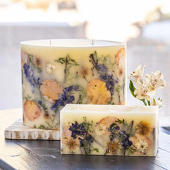 Rosy Rings Vanilla Rain brick candle highlights elegant botanicals for decorative lighting and ambiance.