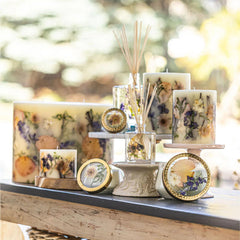 Gift-ready Rosy Rings Vanilla Rain invites thoughtful gifting with decor and scent