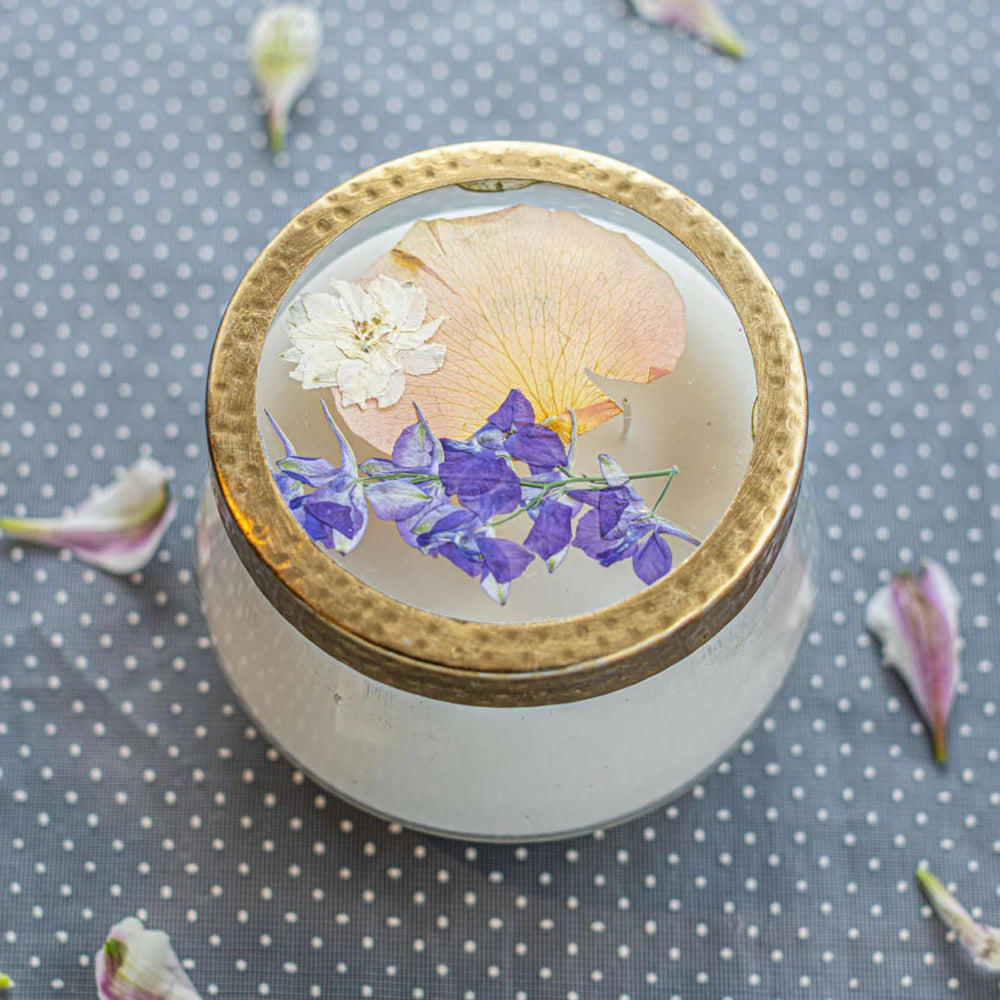 Rosy Rings Vanilla Rain candle features two wicks for even burn and fragrance spread