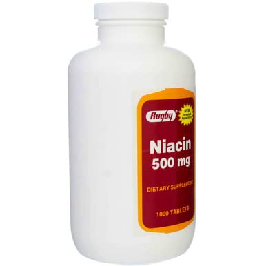 Pill-dispense moment of Rugby Niacin 500mg tablets ready for daily use.