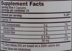 Reguloid product shot with a glass of water illustrating ease of intake