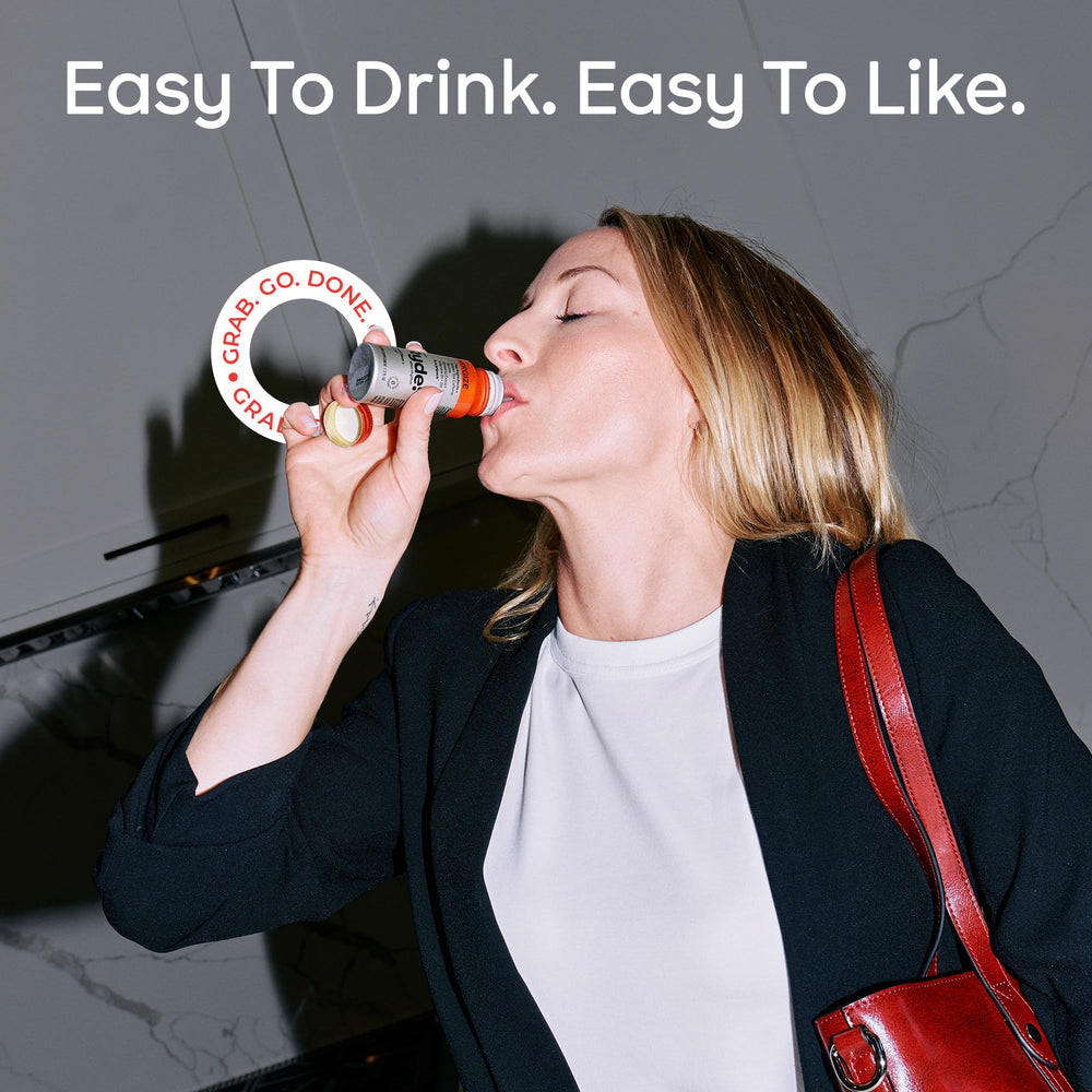 Ryde Energize Shot taurine bottle close-up for sustained alertness.