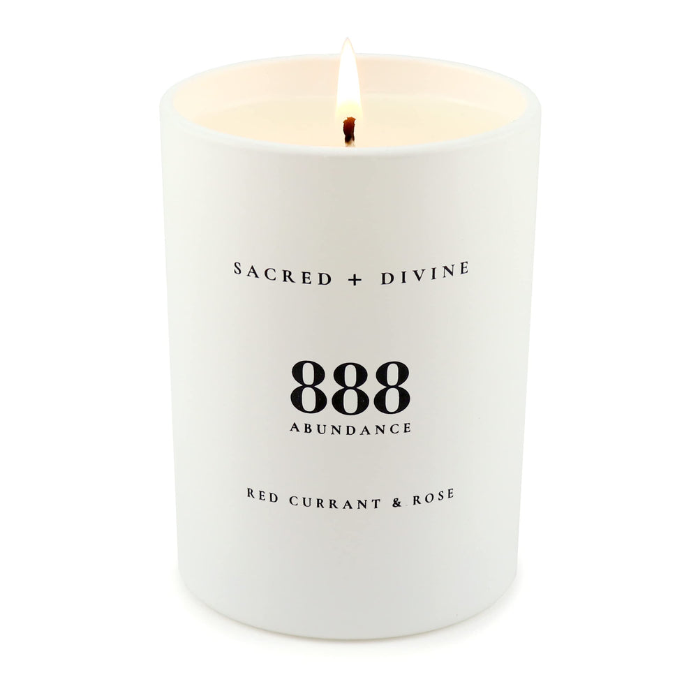 Sacred + Divine 888 candle aroma of red currant and rose to elevate mood during meditation.