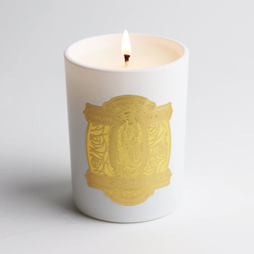 SAINT candle with embedded prayer coin in wax for keepsake and blessing