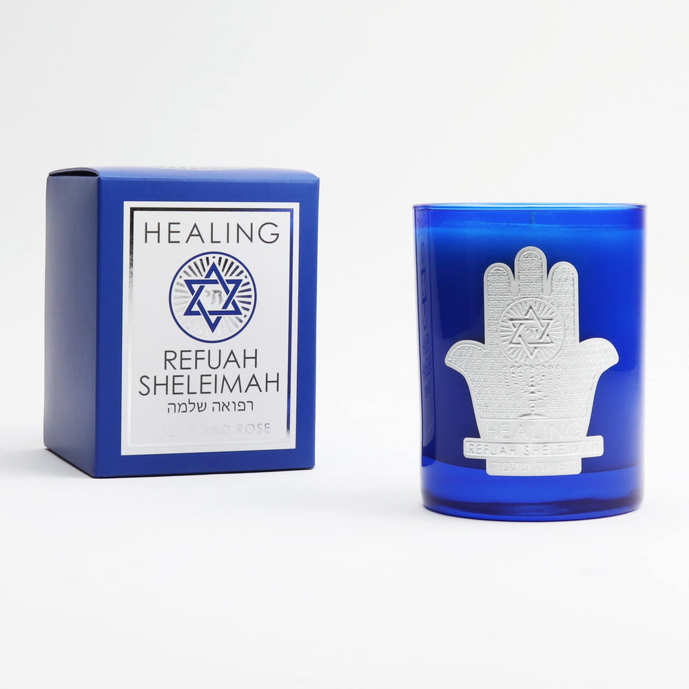 SAINT Refuah Sheleimah candle shows the embedded prayer coin in wax