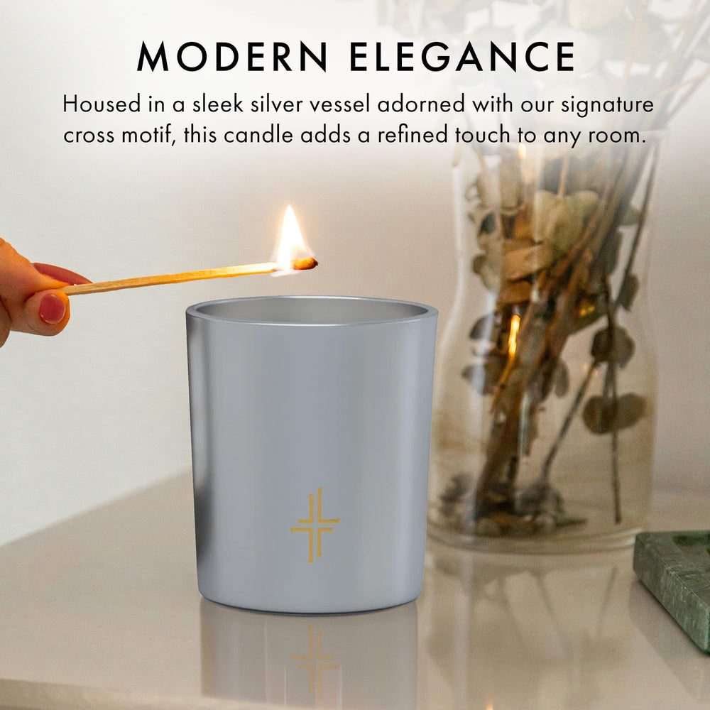 Saint X Ali Landry Sacrament candle with an 80-hour burn time for extended use.