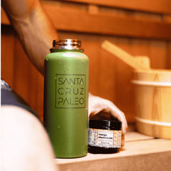 Santa Cruz Paleo Electrolyte Mango glass filled for on-the-go hydration.