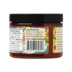 Glass of water with Santa Cruz Paleo P.O.G. ready to drink.