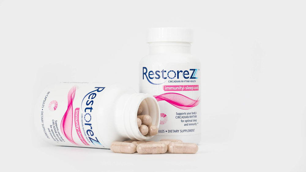 Savant Science RestoreZ Sleep bottle on a nightstand for easy nightly use.