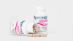 Savant Science RestoreZ Sleep bottle on a nightstand for easy nightly use.