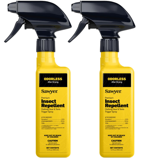 Sawyer Permethrin spray bottle applying protection to outdoor gear for long-lasting fabric defense
