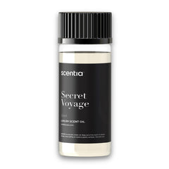 Scentia Secret Voyage bottle 50 mL close-up highlighting cedar and jasmine aroma.