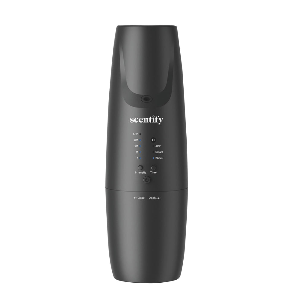 Scentify Plug-in Diffuser V2 plugged into outlet for easy room-wide fragrance.