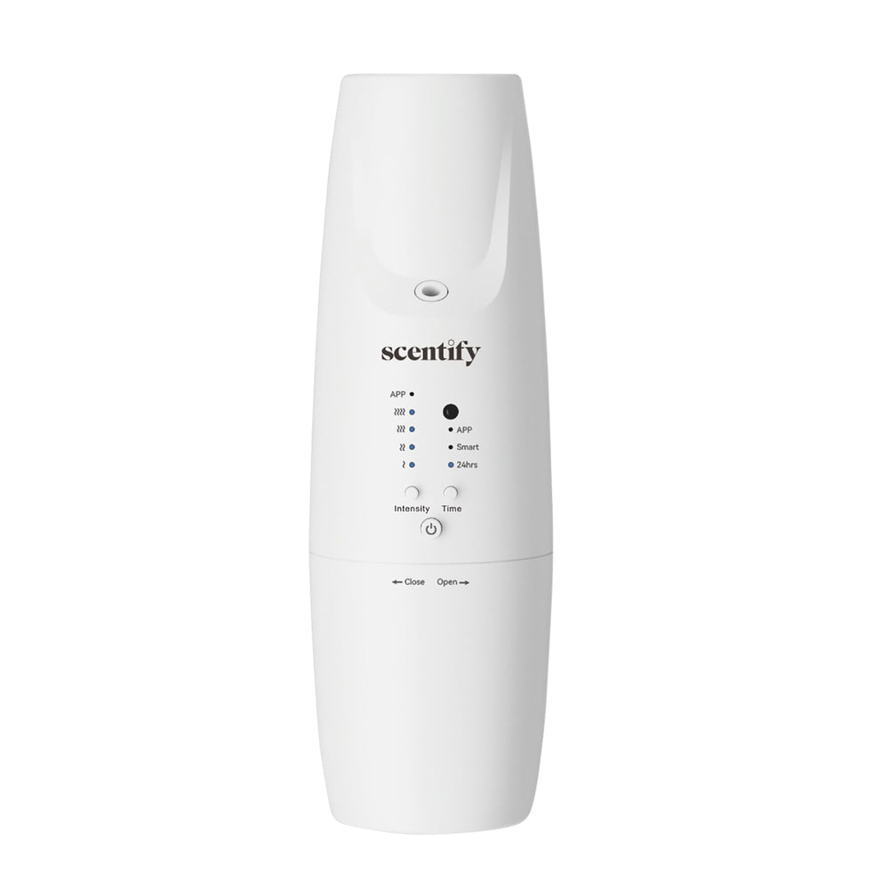 Scentify Plug-in Diffuser V2 in outlet delivering refined aroma to living room