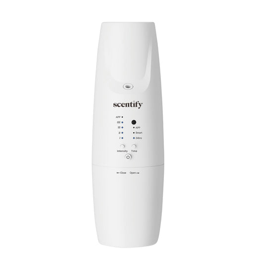 Scentify Plug-in Diffuser V2 in outlet delivering refined aroma to living room