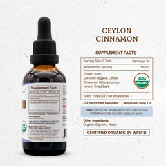 Dropper filled with Secrets of the Tribe cinnamon tincture for recipes