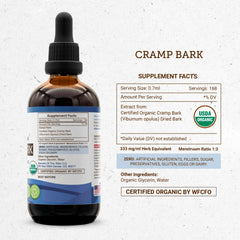 Secrets of the Tribe Cramp Bark Drops dosing scene with precise dropper.