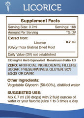 Secrets of the Tribe licorice alcohol-free bottle close-up highlighting purity.
