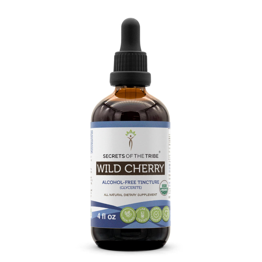 Secrets of the Tribe Wild Cherry bottle pour highlights alcohol-free herbal drops
