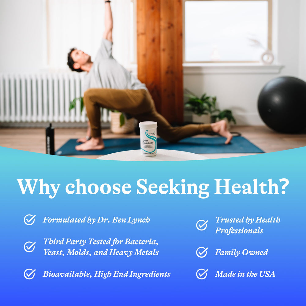 Capsules in hand of Seeking Health Joint Nutrients for daily joint support.