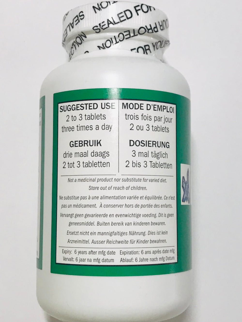 Seven Forests Tang-kuei 18 bottle closeup highlights herbal blend for energy and balance.