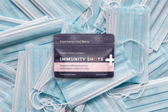 SGC Immunity Shots 12-pack label emphasizes vegan gluten-free attributes for busy days.