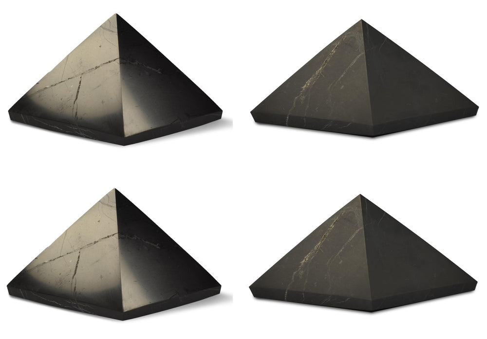 Shungite World 4pcs pyramids polished 50 mm set lends sleek energy balance in any space.