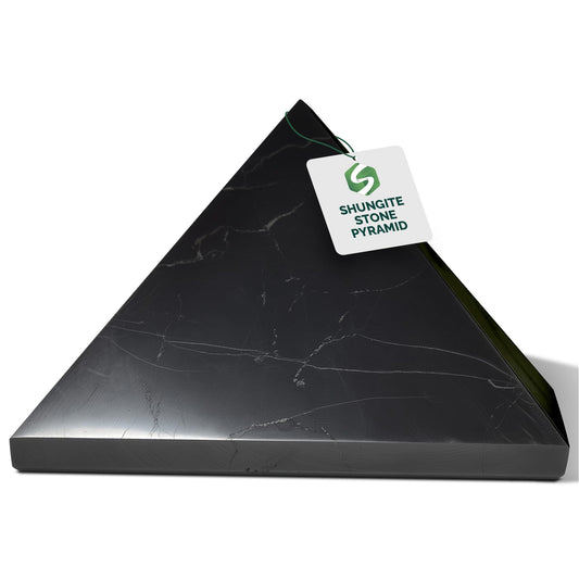 Shungite World authentic 110 mm polished pyramid on display for energy protection.