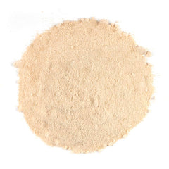 SINGHS waka powder mixing with warm water for a soothing beverage.