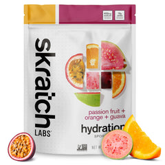 Skratch Labs Hydration Drink Mix bottle being poured for quick hydration during workouts